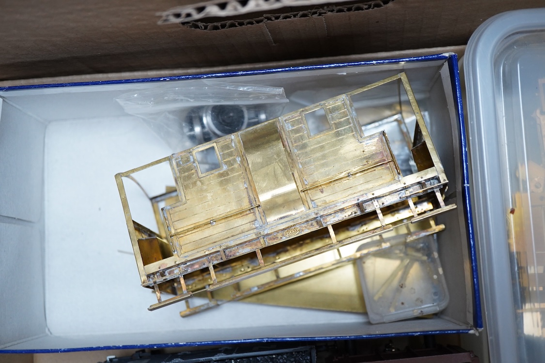 Eleven 0 gauge model railway items including; a bogie stake wagon, two mineral wagons, a North British coal wagon and two further open wagons, a partly constructed brake van, together with a Lima LMS 4F locomotive, two L